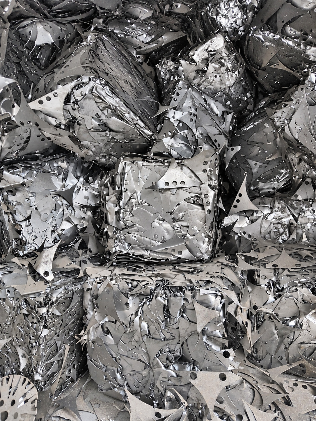 Compressed CRC sheet metal scrap bundles